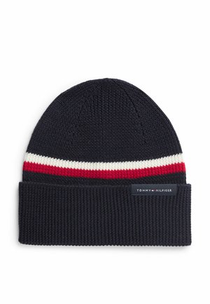 Marineblå strikhue med opbukket kant, hvide og røde striber over kanten samt lille rektangulært Tommy Hilfiger logo-patch på kanten.