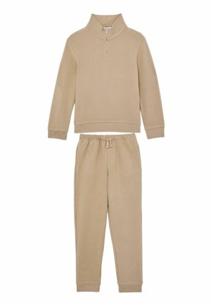 Beige to-delt fleece-sæt med en langærmet half-zip pullover og matchende joggebukser med snøre.