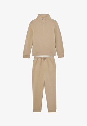 Beiges zweiteiliges Fleece-Set mit langärmeligem Pullover mit halbem Reißverschluss und passenden Jogginghosen mit Kordelzug.