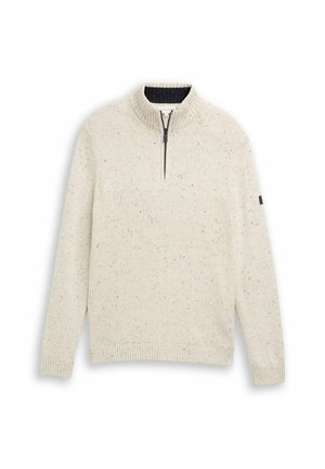 Kermarin täpläknit-sweater puoli-vetoketjulla, ylösnostettu korkea kaulus, hihat ja helma, esitetty litteänä valkoisella taustalla.