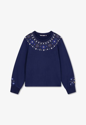 Marineblauwe sweatshirt met lange mouwen, versierd met decoratieve bloemenversieringen in blauw, goud en zilver rond de halslijn en op de mouwen.