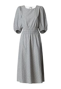 Haljina midi dužine s vertikalnim crno-bijelim prugama, napućenim rukavima do lakta, nabranim strukom i okruglim izrezom s vezicom na leđima.