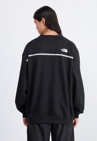 The North Face ZUMU CREW - Melegítőfelső - black