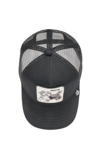 Gorra de camionero negra con malla en la parte trasera, que presenta un parche con la imagen de un perro y la palabra "BESTIE" en blanco. Diseño estructurado con visera curva.
