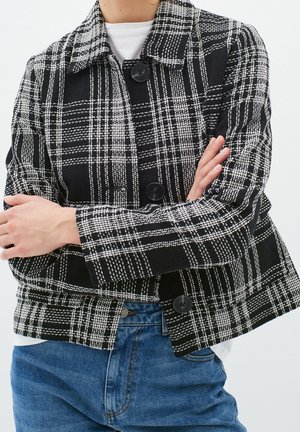 Chaqueta fina - white