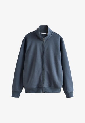 Bluza w ciemnoniebieskim kolorze, z wysokim kołnierzem, pełnym zamkiem z przodu, długimi rękawami, elastycznymi mankietami i gładką fakturą.