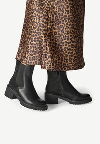 Marco Tozzi Bottines à plateau - black