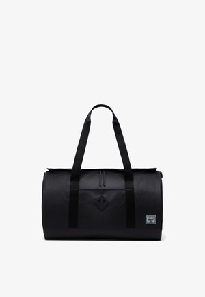 Schwarze Duffel-Tasche aus strapazierfähigem Material, mit stabilen Schulterriemen, einem Reißverschluss oben und einem Diamant-Logo-Patch auf der Vorderseite.