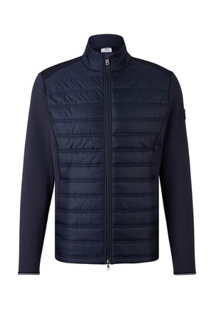 Navy hybrid jacket featuring a puffy quilted front, smooth sleeves, high collar, and full-length zipper, with contrasting texture and design.