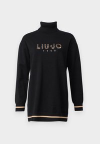 Zwarte coltrui met lange mouwen, voorzien van een rhinestonen logo "LIU JO" en het jaartal "1995", afgewerkt met beigekleurige strepen aan de onderrand en manchetten.