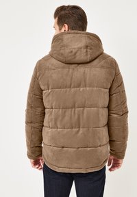 Brown padded jacket with a soft, suede-like texture, featuring a large hood and horizontal stitching across the back.