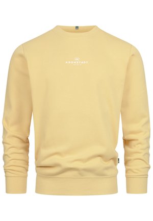 Gelbes Sweatshirt aus weichem Stoff mit rundem Halsausschnitt, langen Ärmeln, gerippten Bündchen und einem kleinen weißen Logo auf der Brust.