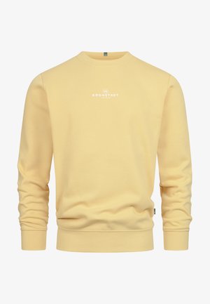 Gelbes Sweatshirt aus weichem Stoff mit rundem Halsausschnitt, langen Ärmeln, gerippten Bündchen und einem kleinen weißen Logo auf der Brust.
