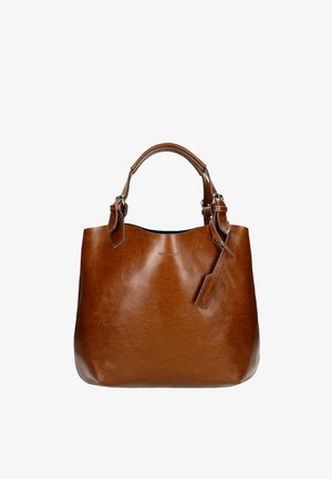 Brown leather handbag with a smooth texture, soft rounded shape, and sturdy top handles; features a small hanging tag detail.