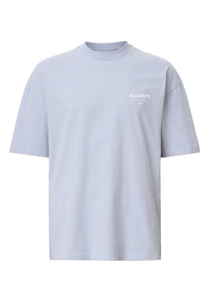 Light blue cotton t-shirt with a crew neck, short sleeves, and a small white logo on the chest. Features a relaxed fit and plain design.