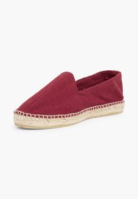 Bordeaux espadrille met een textiel bovenwerk, ronde neus en voetbed van jute touw. Instapontwerp met minimale stiksels.