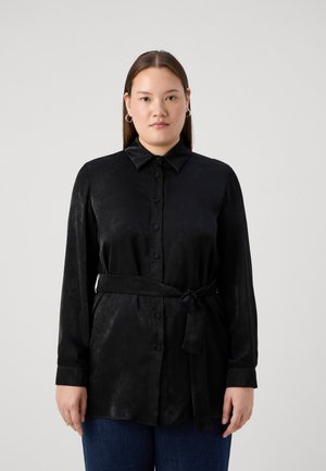 Black long-sleeve shirt made of smooth fabric, featuring a button-up front and a tied belt at the waist, with a classic collar and cuffs.
