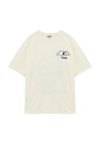 Creme bomulds kortærmet t-shirt med et broderet Snoopy-design, der inkluderer en musiknote og teksten "Peanuts", klassisk rund halsudskæring.