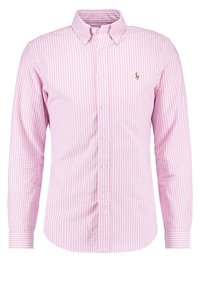 Różowa w paski, długozasłonięta koszula z kołnierzykiem na guziki, białymi guzikami i małym haftowanym logo. Bawełnowy materiał o gładkiej strukturze.