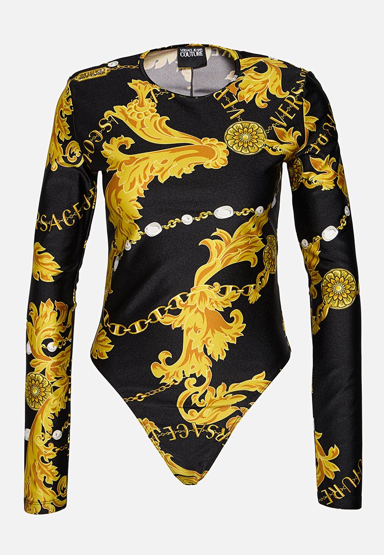 Bodysuit noir à manches longues avec un imprimé baroque doré. Présente une coupe ajustée, une texture lisse et une fermeture par pression en bas.
