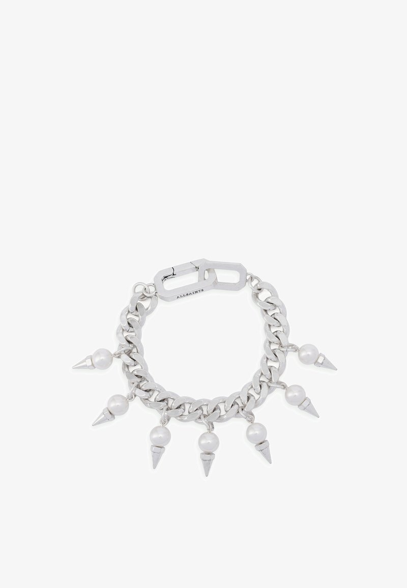 Bracelet en chaîne argentée avec des perles alternées et des accents métalliques pointus, fermé par un fermoir. Les maillons texturés ajoutent de l'intérêt visuel.