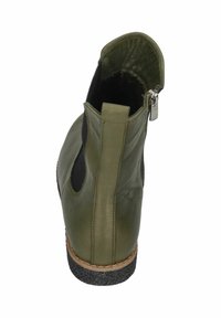 Green leather ankle boot with a black elastic side panel, featuring a zip closure and textured rubber sole. Smooth finish with a rounded toe.