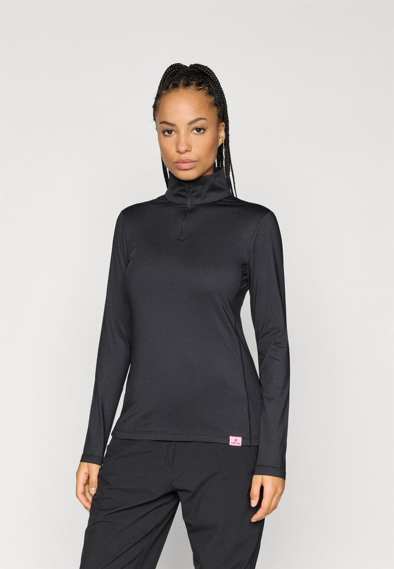 Camisola de desempenho preta de mangas longas com gola alta, fecho de meio zíper, costuras planas e um pequeno logótipo rosa na bainha. Textura suave.