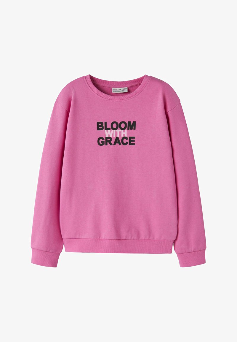 Sweat-shirt rose à manches longues avec poignets et ourlet côtelés, affichant le texte "BLOOM WITH GRACE" en noir et rose clair centré sur le devant.