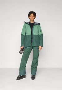 Norrøna LOFOTEN INSULATED PANTS - Lyžařské kalhoty - jungle green