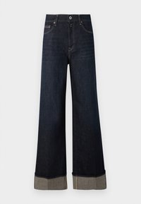 Donkerblauwe high-waisted wijde jeans met een raw hem, voorzien van lichtbruine stiksels en een opgerolde zoom die contrasterende stof onthult.