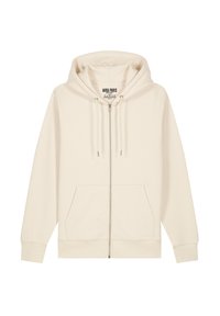 Felpa con zip di un leggero beige realizzata in tessuto morbido. Presenta un grande cappuccio, lacci e due tasche frontali. Design semplice con polsini a costine.