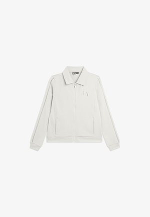 Chaqueta blanca con cierre de cremallera y cuello, mangas largas con detalles de líneas cosidas, y logotipo "F" y "Y" en el pecho izquierdo.