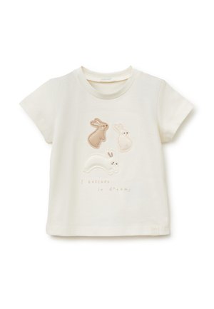 Maglietta per bambino piccolo color crema con tre applicazioni cucite a forma di coniglio e la frase "Credo nei sogni" in testo marrone chiaro.