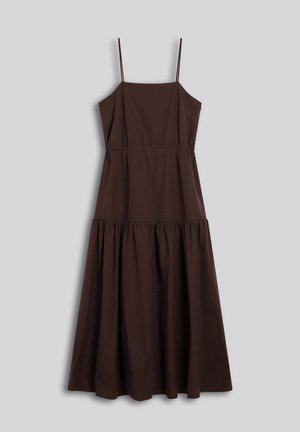 Brown sleeveless midi dress with thin straps, fitted waist, and a gathered skirt on a gray background.