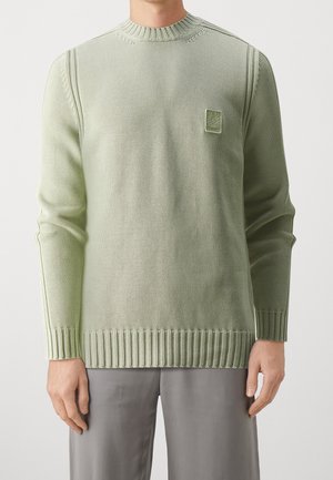 Stickad tröja - olive