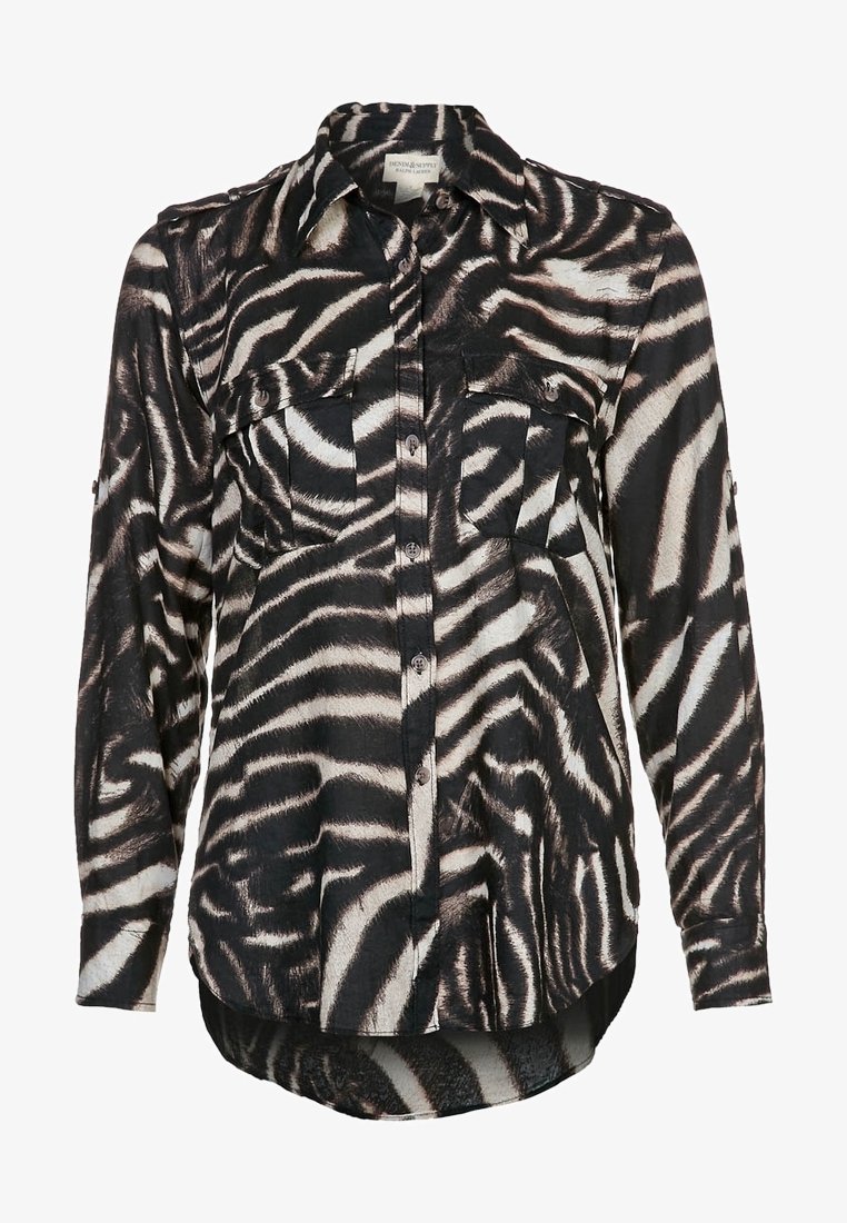 Koszula na długi rękaw z czarno-białym wzorem zebry, zapinana na guziki, z dwoma kieszeniami na piersi i kołnierzykiem, delikatnie dłuższy tylny brzeg.