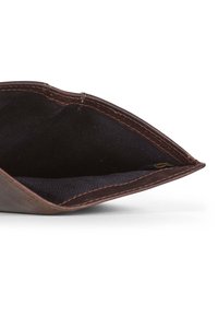 Brown leather wallet featuring a textured exterior, open interior with navy fabric lining, and contrasting stitching detail.
