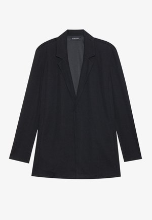 Svart långärmad blazer med slag, rak fåll och strukturerade axlar, liggande platt på en vit bakgrund.