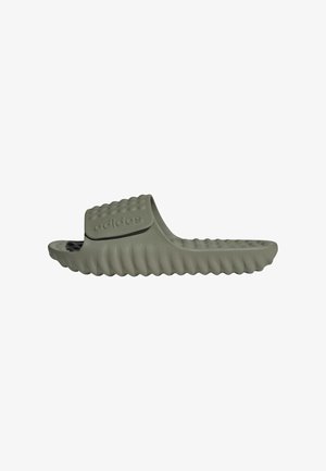 Gray slide sandal with a textured upper, ribbed sole, and an embossed logo on the strap. Made of soft, durable material for comfort.