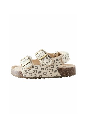 Sandale pour tout-petit beige avec imprimé léopard, deux boucles réglables, semelle en liège et design à bout et talon ouverts.