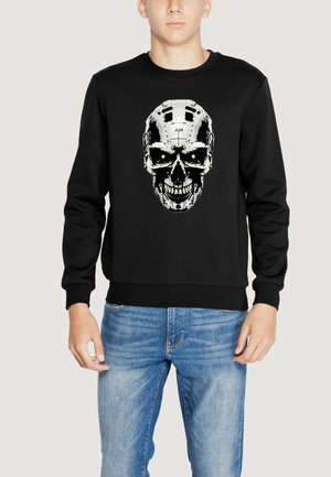 Sudadera negra con un diseño central de calavera en blanco y verde, confeccionada en una tela suave con puños y dobladillo acanalados.