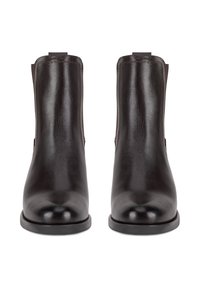 Tumši brūni ādas potītes zābaki ar gludu apdari, elastīgām sānu daļām, apaļiem pirkstiem un plakanu gumijas zoli. Klasisks minimālisma dizains.