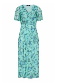 Robe légère en teal avec décolleté en V, manches courtes et flottantes, et un motif léopard dans des tons plus foncés de vert et de bleu.