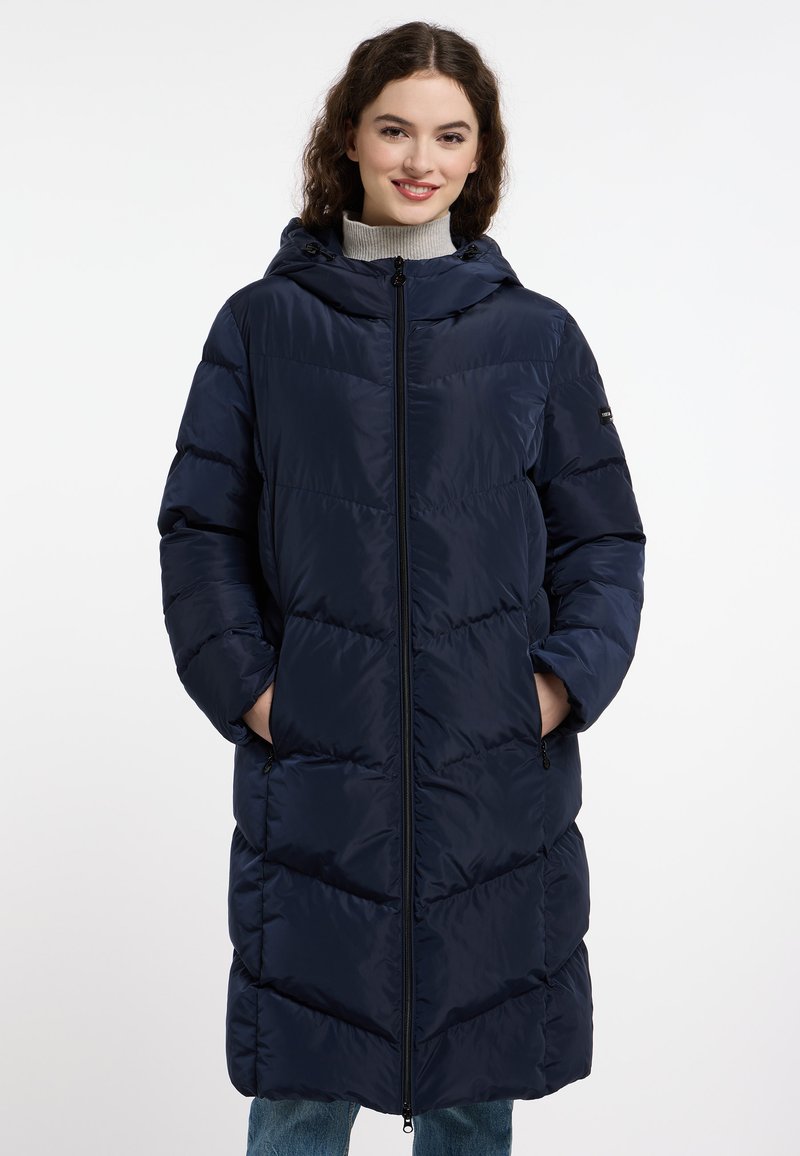 Navy blue puffer coat with a hood, featuring a full zipper and side pockets, quilted pattern, and a relaxed fit. Soft, smooth texture.