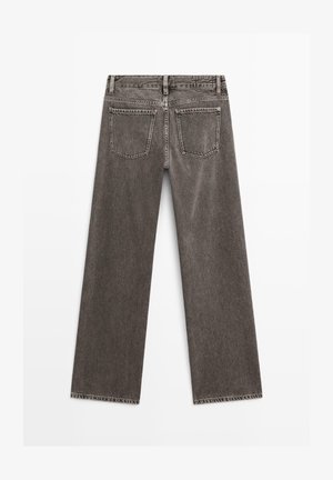 Jeans grigi a gamba dritta con vita alta, dotati di cinque tasche e orli sfrangiati. Realizzati in denim con una finitura strutturata.