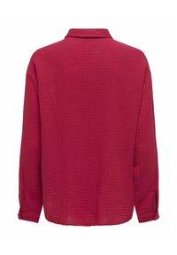 Crimson textured blouse with a collar, long sleeves, and button cuffs; features a relaxed fit and subtle crinkle design.