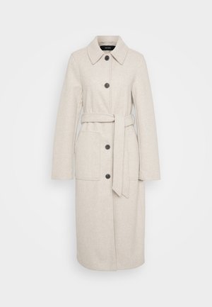 Pikk beež villane mantel mustade nuppudega, lai krae, kaks eesmist taskut ja sobiv vöö, mis on taljel seotud.