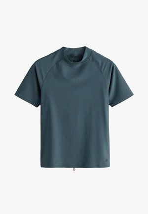 T-shirt de sport à manches courtes couleur vert sarcelle foncé avec col rond et coutures raglan, taille moyenne, sur fond blanc.