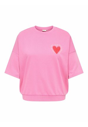 Pink short-sleeve sweatshirt with round neck and red heart graphic on left chest surrounded by curved text.