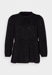 Haut noir avec un col froncé et un détail à nouer, présentant de longues manches bouffantes et une coupe décontractée. Motif pailleté sur l'ensemble du tissu.